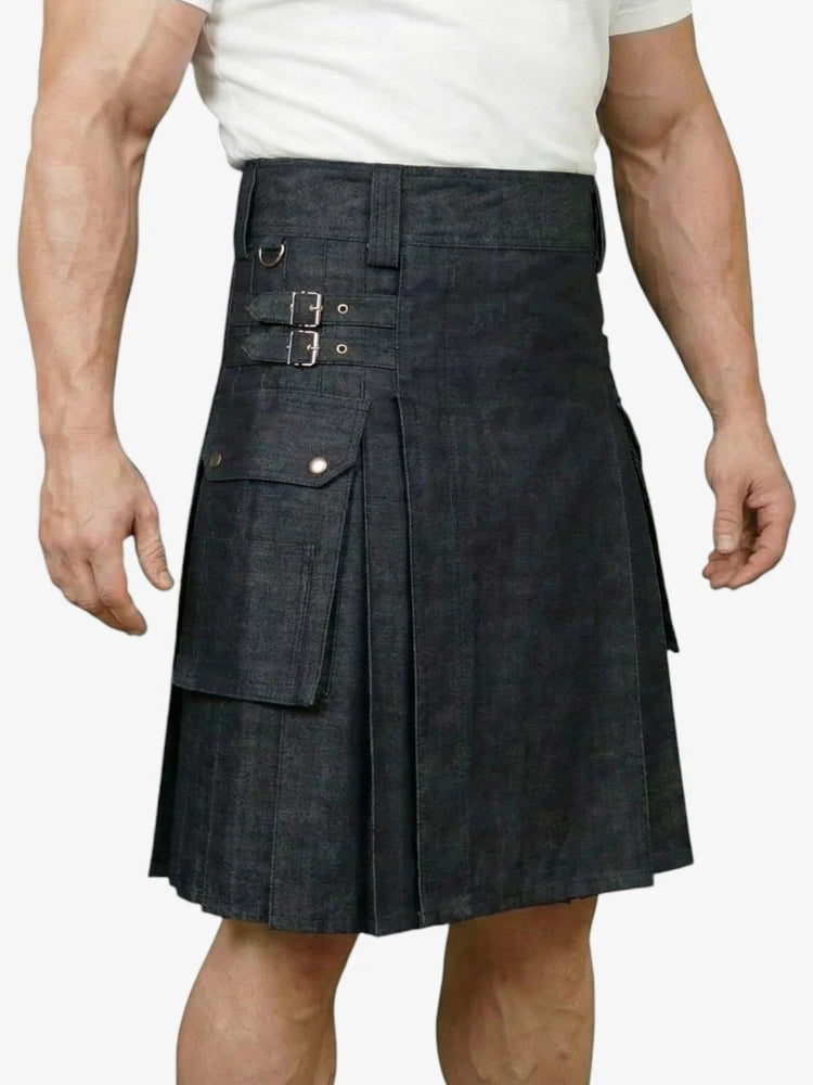 Black kilt worn by a person on a white background