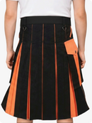 Black and orange pleated skirt worn by a person on a white background