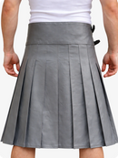 Gray pleated skirt worn by a person on a white background