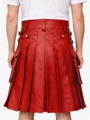Red leather skirt worn by a person on a white background