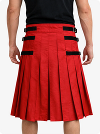 Red pleated skirt with black straps on a white background