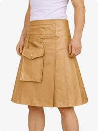 Tan leather skirt with a white background